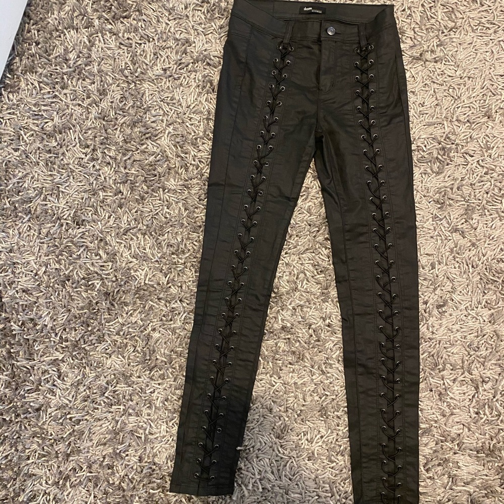 Black lace up skinny jeans